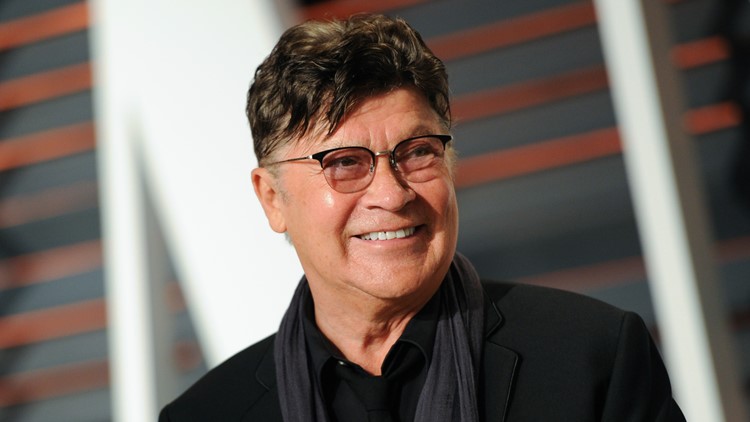 Robbie Robertson, lead guitarist and songwriter of The Band, dies at 80